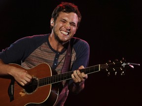 Phillip Phillips performs at the Rock in Rio Music Festival in Rio de Janeiro September 21, 2013. REUTERS/Ricardo Moraes