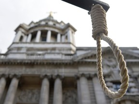 A replica hangman's noose is seen during a protest outside the Old Bailey courthouse in London in this February 26, 2014 file photo. (REUTERS/Toby Melville)