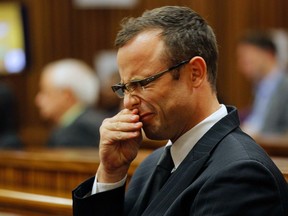 Olympic and Paralympic track star Oscar Pistorius sits in the dock at the North Gauteng High Court in Pretoria March 11, 2014. Pistorius is on trial for the murder of his girlfriend Reeva Steenkamp at his suburban Pretoria home on Valentine's Day last year. (REUTERS)