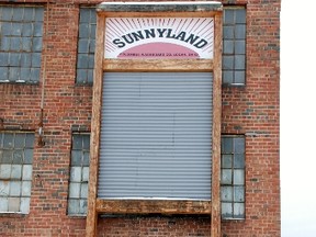 The world’s biggest washboard hangs on the wall of the Columbus Washboard Co. in Logan, Ohio. The town holds an annual washboard music festival in June. WAYNE NEWTON/Special to QMI Agency