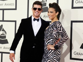 Robin Thicke and his estranged wife Paula Patton reunited for a family outing in Vancouver on Saturday for the first time since announcing their split last month.

REUTERS/Danny Moloshok