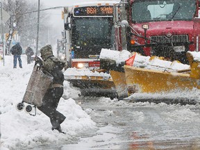 Snowplow on Kingston Rd. in Toronto. (Craig Robertson/Toronto Sun)
