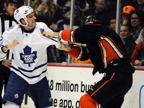 Toronto Maple Leafs right wing David Clarkson and Anaheim Ducks defenceman Ben Lovejoy (6) fight during the first period at Honda Center on Monday night. (Kelvin Kuo-USA TODAY Sports)
