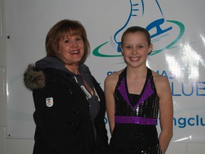 Coach Jill Wismer, left, stands with skater Grace Renner of the St. Thomas Skating Club at Memorial Arena in St. Thomas. Renner is headed to the Skate Ontario StarSkate Championship in Wellington this weekend. Ben Forrest/Times-Journal