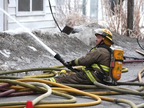 Firefighters battle a blaze that destroyed a two-storey apartment building on Simmons Road in Wilton.