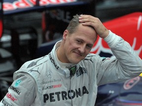 Former Formula One world champion Michael Schumacher seems to be making progress in his recovery after a skiing accident. (AFP PHOTO/YASUYOSHI CHIBA)
