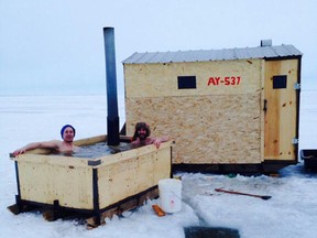 Delhi, Ont., area resident Scott Chesterman and Mike Saunders of St. Williams built a hot tub and towed it out onto the Inner Bay of Long Point near Booth's Harbour earlier this month. (Holly Porter/Contributed photo)