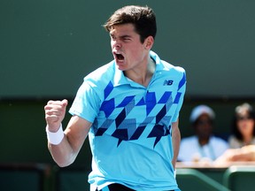 Milos Raonic reacts as he wins his match against Andy Murray (not pictured) during the BNP Paribas Open in Indian Wells, Calif., March 12, 2014. (JAYNE KAMIN-ONCEA/USA Today)