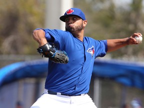 Blue Jays pitcher Ricky Romero delivers against the Tampa Bay Rays in Dunedin on Wednesday. (Veronica Henri/Toronto Sun)
