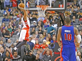 Raptors’ DeMar DeRozan seals the deal with a monster jam against the Pistons on Wednesday night. (CRAIG ROBERTSON/Toronto Sun)