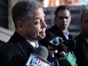 Calgary MLA Len Webber speaks to the media outside the McDougall Centre, announcing his departure from the Tory caucus,on March 13, 2014. Mike Drew/Calgary Sun