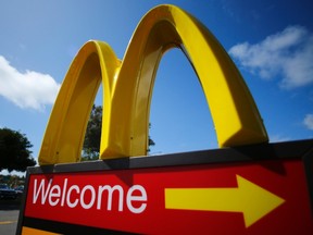 A McDonald's restaurant sign is seen at a McDonald's restaurant in Del Mar, California in this file photo from April 16, 2013.   REUTERS/Mike Blake/Files