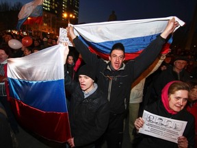 Pro-Russian demonstrators take part in a rally in Donetsk March 13, 2014. (REUTERS/Stringer)