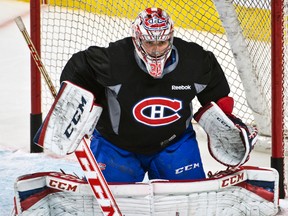 Montreal Canadiens goaltender Carey Price will not participate in practices until he is fully healed. (MARTIN CHEVALIER/QMI Agency)