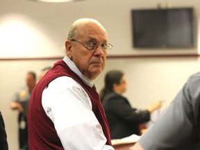 Curtis Reeves Jr. looks into the gallery during his bail hearing in Dade City, Florida, February 5, 2014. Reeves, a former Tampa police captain, is charged with second-degree murder for killing a fellow moviegoer Chad Oulson on January 13, 2014 during an argument over cellphone use.  REUTERS/Andy Jones/Tampa Tribune/Pool