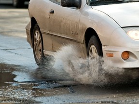 Thanks to a brutal and long winter, Ottawans have now entered pothole season. Ottawa Sun/File photo