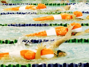 Competitors in the junior lifeguard competition cut through the water at the TransAlta Tri Leisure Centre in last year’s competition. - Gord Montgomery, File Photo