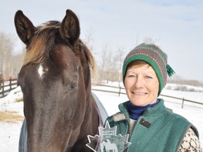 Parkland County’s Kathy Playdon, shown here with her horse Glory, was one of six national recipients of The Coaching Excellence Award presented by Equine Canada for her contributions to the sport. - Photo Supplied
