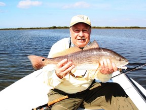 Neil with a Texas redfish. (Supplied)