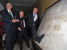 Bill Ballard, right, is joined by Ryerson University president Sheldon Levy, left, and former Toronto mayor David Crombie, centre, during renovations to Maple Leaf Gardens in October 2010. (Michael Peake/Toronto Sun)