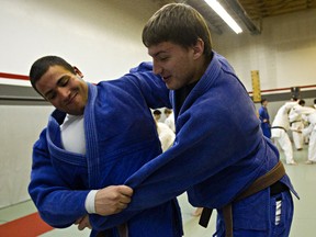 Tarek El Mayergi, left, and Teddy Bruma train at their club in St. Albert in preparation for the Edmonton International Judo Championships this weekend at West Edmonton Mall. (Codie McLachlan, Edmonton Sun)