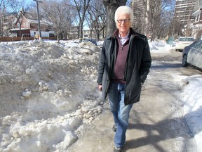 David C. Walker wrote the book about how Portage and Main was closed to pedestrians; he says it's time to re-open it. (Chris Procaylo/Winnipeg Sun)