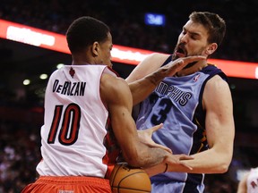 Raptors' DeMar DeRozan plays physical against Memphis Grizzlies' Marc Gasol on March 14. (Craig Robertson, Toronto Sun)
