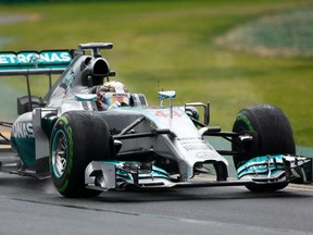 Mercedes' Lewis Hamilton drives during the qualifying session for the Australian Grand Prix at the Albert Park circuit in Melbourne March 15, 2014. (REUTERS/Brandon Malone)