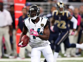 Jacksonville Jaguars wide receiver Justin Blackmon carries the ball for a touchdown during NFL play against the St. Louis Rams at The Edward Jones Dome. (Scott Kane/USA TODAY Sports)