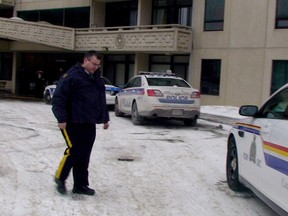 An RCMP officer patrols the area outside the Stewart Ave. apartment where a Russian diplomat was allegedly stabbed on Friday, March 14, 2014. Military man Kevin Martin appeared in court Saturday, March 15, 2014 on a charge of aggravated assault.
Danielle Bell/Ottawa Sun/QMI AGENCY