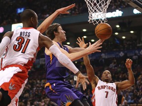 Phoenix Suns guard Goran Dragic (1) goes to the basket and scores against the Toronto Raptors at Air Canada Centre on March 16. (Tom Szczerbowski-USA TODAY Sports)