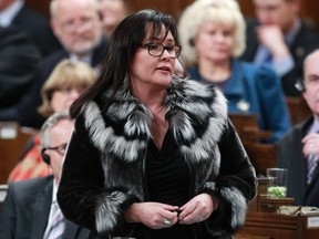 Environment Minister Leona Aglukkaq speaks during Question Period on Parliament Hill in Ottawa January 30, 2014.     REUTERS/Blair Gable