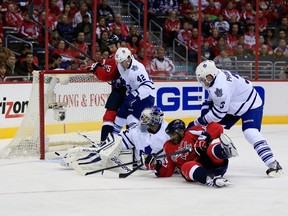 Capitals' Joel Ward shoots the puck past Maple Leafs goalie James Reimer on Sunday at the Verizon Center in Washington, D.C.