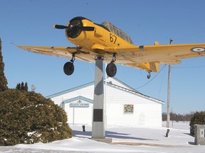 The Harvard that is the subject of a restoration campaign occupies its usual position on a pedestal in front of the 416 Wing Royal Canadian Air Force Association building at Norman Rogers Airport. (Michael Lea The Whig-Standard)