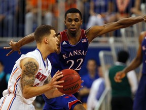 A tournament final between Andrew Wiggins (right) and the Kansas Jayhawks and Jabari Parker’s Duke would be a fantastic sendoff for this year’s NCAA tournament. (USA TODAY SPORTS)