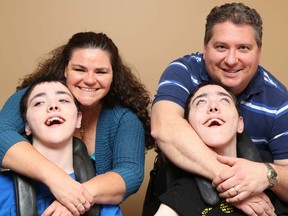 Gino Donato/The Sudbury Star
Paula and Kyle Watson, with their sons, Ian and Scott, at their home in Val Therese.