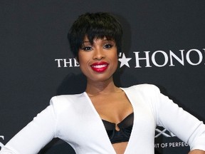 Singer Jennifer Hudson poses on the red carpet during the BET Honors 2014 at Warner Theatre in Washington, February 8, 2014. REUTERS/Jose Luis Magana