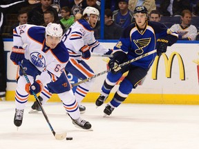 Edmonton Oilers right wing Nail Yakupov (64) skates with the puck against the St. Louis Blues during the first period at Scottrade Center, March 13, 2014. (Jasen Vinlove-USA TODAY Sports)