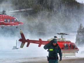 STARS air ambulance lifts off  for Calgary, with a man who was caught in an avalanche near Lake Louise, Alberta on Saturday March 15, 2014. Al Charest/Calgary Sun