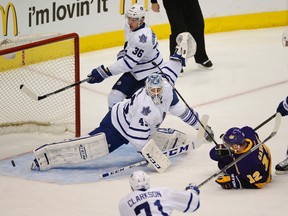 Toronto Maple Leafs goalie Jonathan Bernier (45) makes a save on Los Angeles Kings right wing Marian Gaborik (12) during the first period at Staples Center in Los Angeles March 14, 2014. (Richard Mackson-USA TODAY Sports)