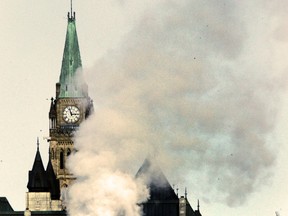 Steam from the Cliff Central Heating and Cooling Plant obscures the Peace Tower on Parliament Hill during a frosty winter morning in late February. Monday was the coldest St. Paddy's Day on record and forecasters are expecting a cooler than usual start to spring.
Darren Brown/Ottawa Sun/QMI Agency