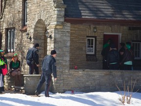 Students hosting a party on Huron Street had two kegs confiscated by London Police after their party was stopped Monday afternoon during St. Patrick's day in London, Ont. on Monday March 17, 2014. 
One student at the party said the police came after a neighbour complained about a student urinating outside.
Mike Hensen/The London Free Press/QMI Agency