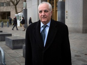 Daniel Bonventre, former back-office director for Bernard L. Madoff Investment Securities LLC, exits Manhattan Federal Courthouse in the Manhattan Borough of New York Feb. 24, 2014.REUTERS/Carlo Allegri