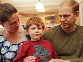 Sarah Pardy, with her five-year-old son Noah and husband Paul, at their home in the Kingston's west end. The Pardy family has been dealing with the negative health effects that electromagnetic fields have on their son. 
Julia McKay/Kingston Whig-Standard/QMI Agency