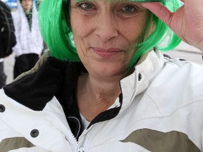 Jayne Fisher of Lyndhurst wears a green hat and wig as she celebrated St. Patrick's Day at the Tir Nan Og in Kingston on Monday. The Irish bar charged a $5 cover which was donated to the Kingston  Irish Folk Club. 
IAN MACALPINE/KINGSTON WHIG-STANDARD/QMI AGENCY