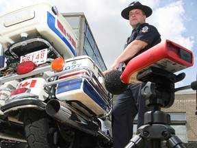 Edmonton Police Service Cst. Eric Theuser demonstrates motorcycle exhaust decibel testing,  at the EPS Southeast Division Station, 104 Youville Drive East, Thursday June 2, 2011. Motorcyclists can have their exhaust noise tested, without penalty, during two upcoming noise level clinics at the NAIT South Parking Lot, 7110 - Gateway Blvd, June 4 and June 11 from 10 a.m. to 4 p.m. DAVID BLOOM/EDMONTON SUN  QMI AGENCY