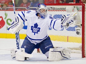 Toronto Maple Leafs goalie James Reimer makes a save against the Washington Capitals during the first period at Verizon Center on March 16, 2014. (PAUL FREDERIKSEN/USA TODAY Sports)
