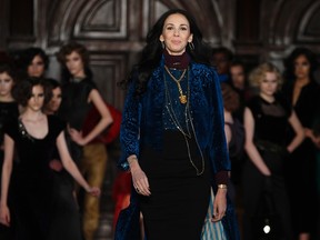 Designer L'Wren Scott is seen following her Fall/Winter 2012 collection during New York Fashion Week February 16, 2012.    REUTERS/Carlo Allegri