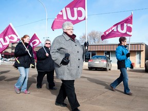 CUPE workers rallied against pension cuts on Saturday in front of MLA Richard Starke's office.