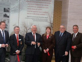 Ontario Attorney General John Gerretsen, centre, shares a laugh after helping cut the ribbon at the new consolidated Elgin County Courthouse in St. Thomas on Tuesday. Gerretsen was joined by Elgin-Middlesex-London MPP Jeff Yurek, second from left, Elgin county Warden David Marr, St. Thomas Mayor Heather Jackson, Elgin-Middlesex-London MP Joe Preston and former Elgin-Middlesex-London MPP Steve Peters. Ben Forrest/Times-Journal